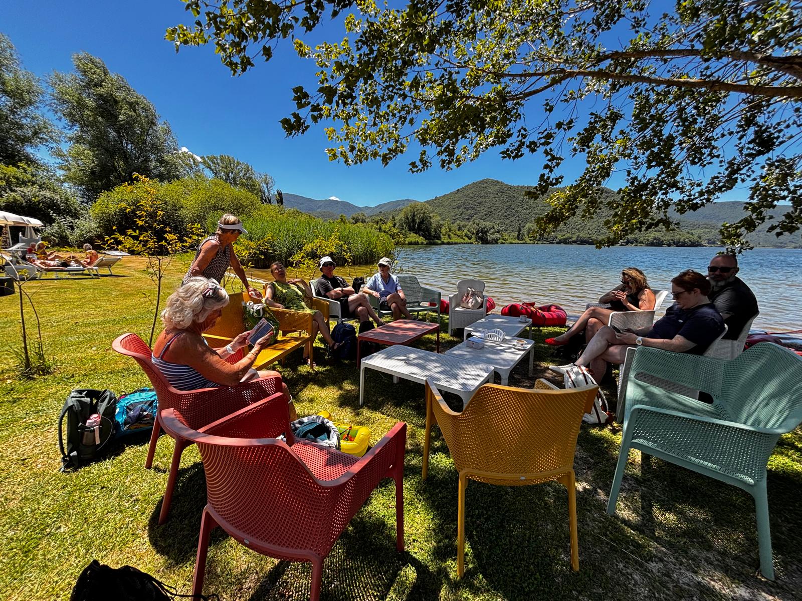 Colourful chairs at the edge of Lake Piediluco