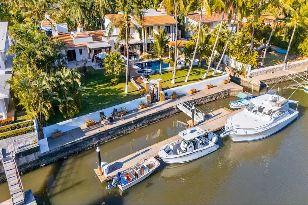 Aerial view of the villa, gardens and private dock