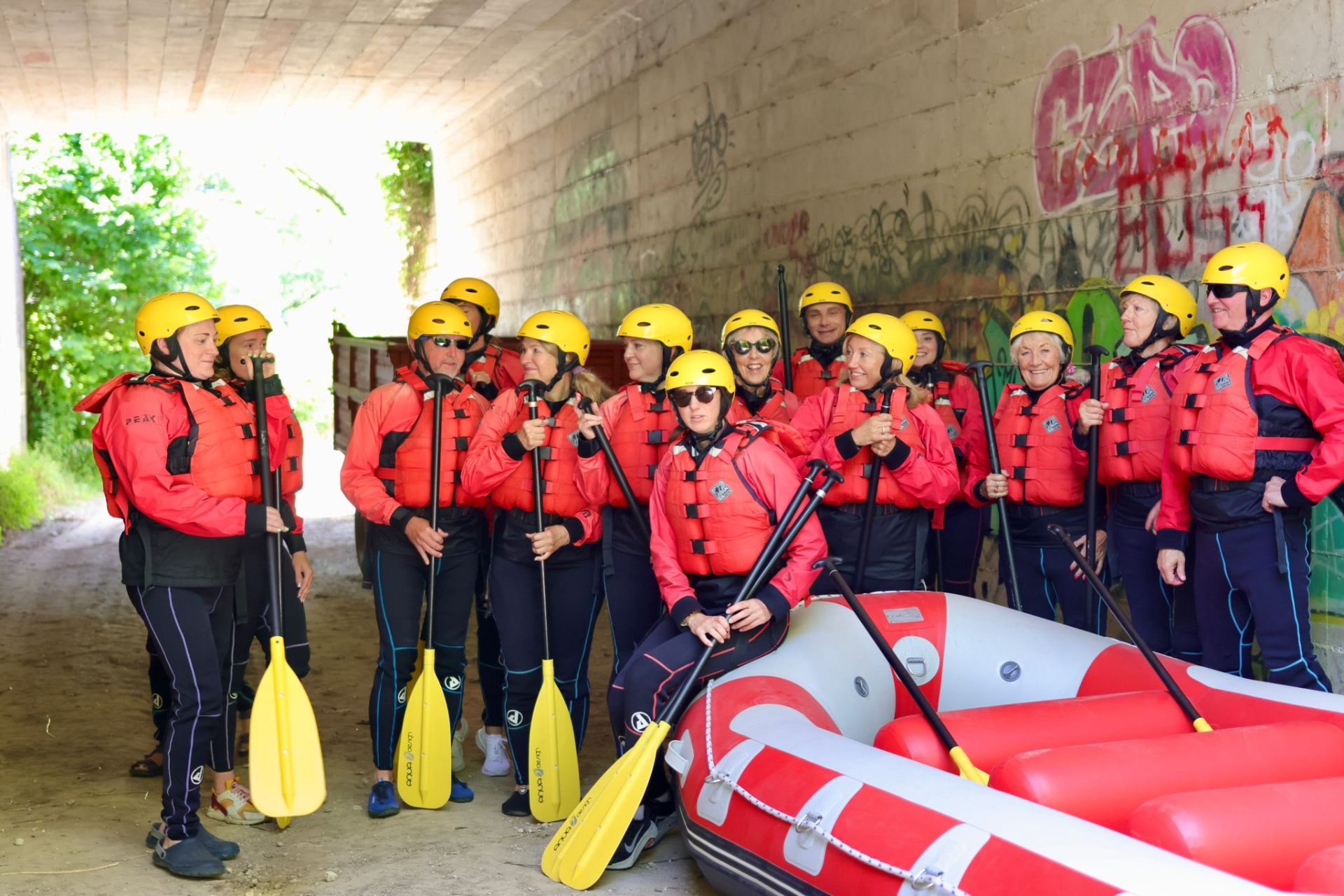 Rafting group in red life jackets